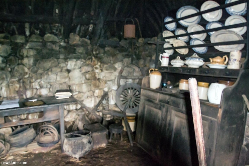 Old dresser, spinning wheel and visitors table in the main living area. Isle of Skye, Colbost Croft Museum - Main living area
