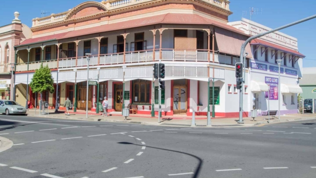 Built 1878-1923; Two parts: two storey rendered brick with verandahs, and a two storey stuccoed wing; no longer functions as hotel; 310 Kent Street; Qld Register #600696 Queensland Pubs