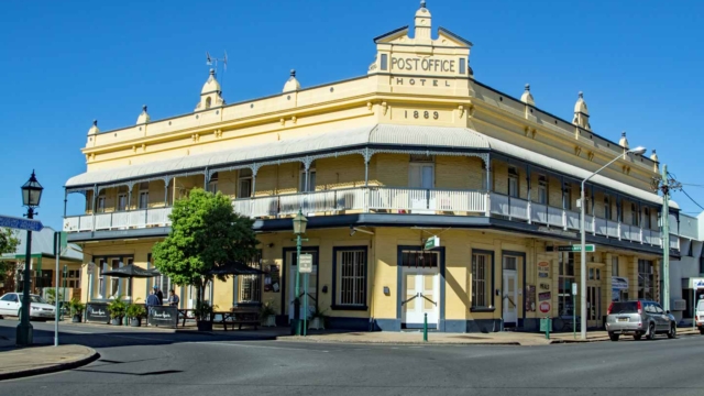 Built 1889; Two storey brick building; hipped corrugated iron roof; cantilevered verandahs with bull-nosed corrugated iron awning, reeded cast-iron columns with cast iron friezes and brackets; Bazaar Street Maryborough; Qld Register #600691 Queensland Pubs